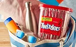 a large container of Twizzlers Strawberry Flavored Twists candy. 
