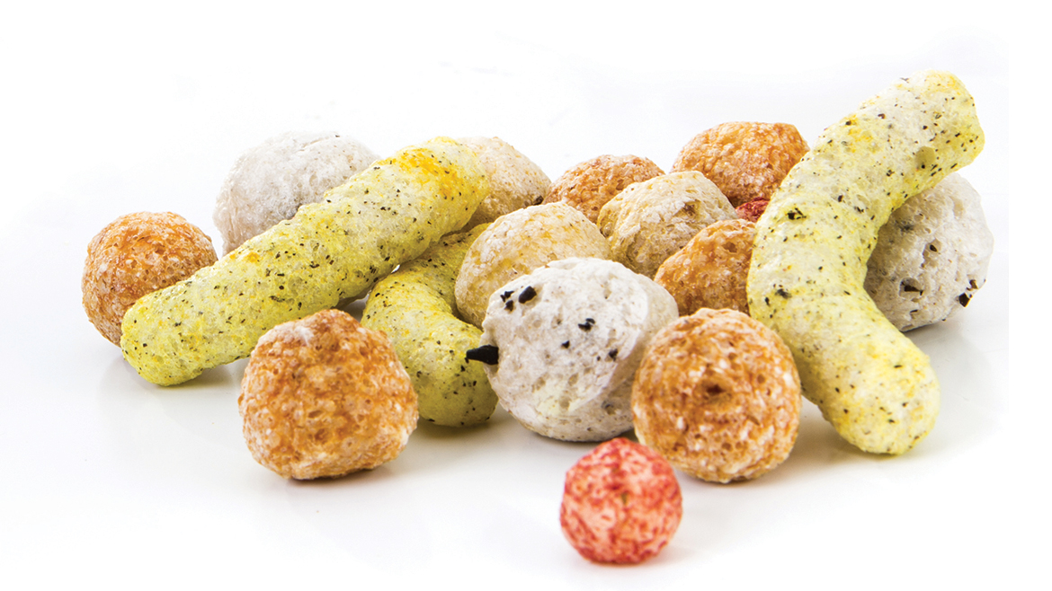 Assorted colors and shapes of coated extruded snacks
