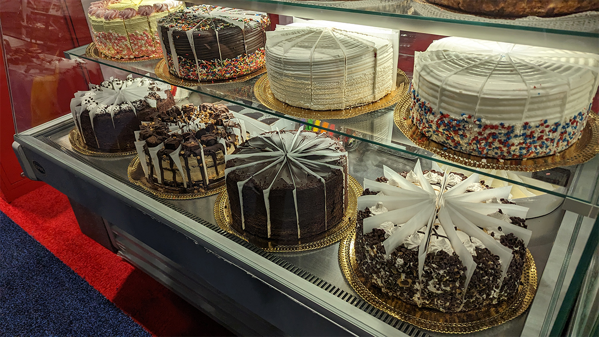 A display of chocolate and vanilla cakes at the 2025 National Restaurant Association Show.