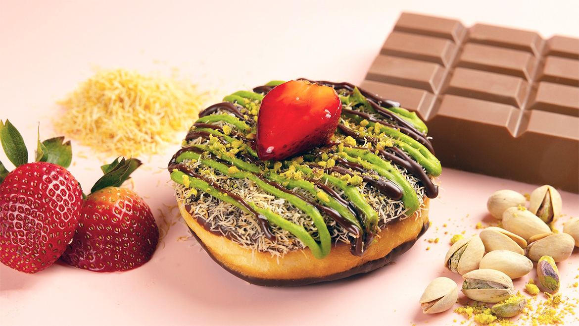 The item shown is the Dubai Chocolate doughnut from Pinkbox Doughnuts.