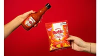 This image features a collaboration between Frank's RedHot and Huer Foods to create Spicy Gummy Bears. This image features a collaboration between Frank's RedHot and Huer Foods to create Spicy Gummy Bears.
