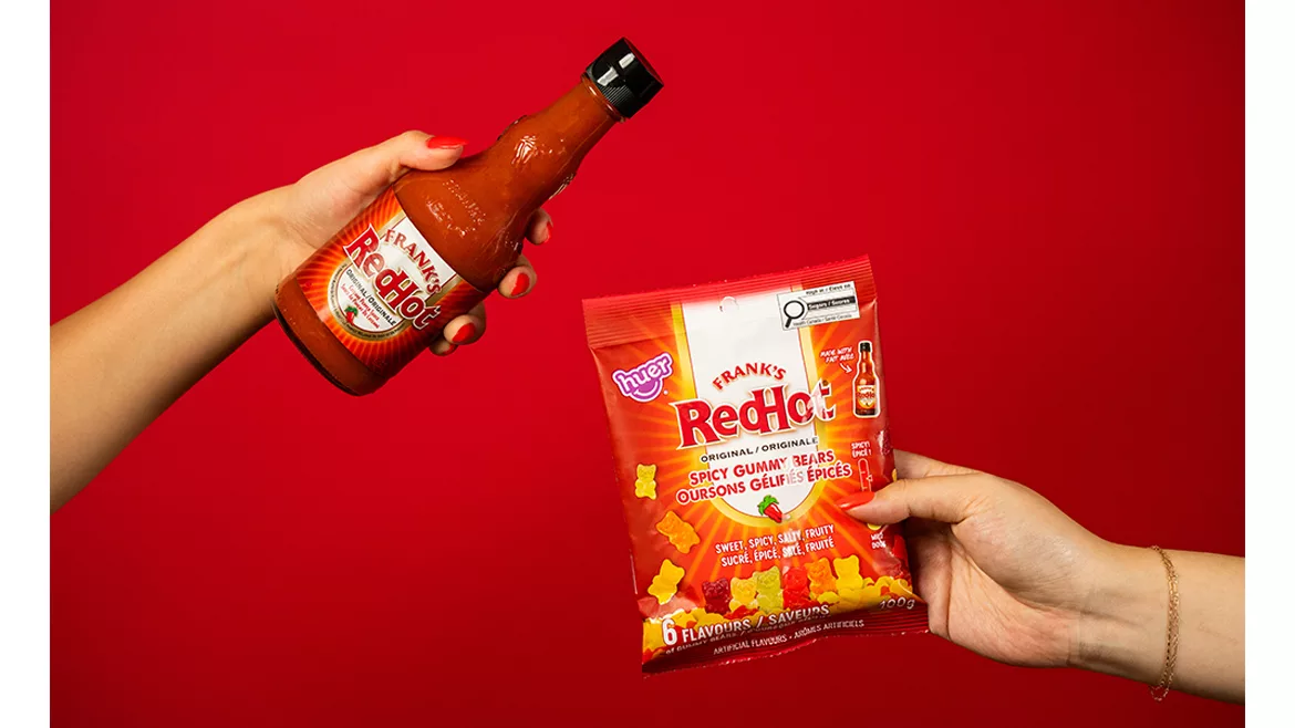 This image features a collaboration between Frank's RedHot and Huer Foods to create Spicy Gummy Bears.