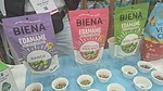 Sample cups on table at Biena Snacks booth