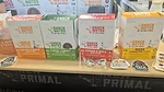 Cartons of New Primal meat snacks in tradeshow booth