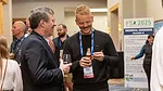This image appears to capture a moment from the FSX 2025 General Sessions, likely a networking or social event involving industry professionals. 