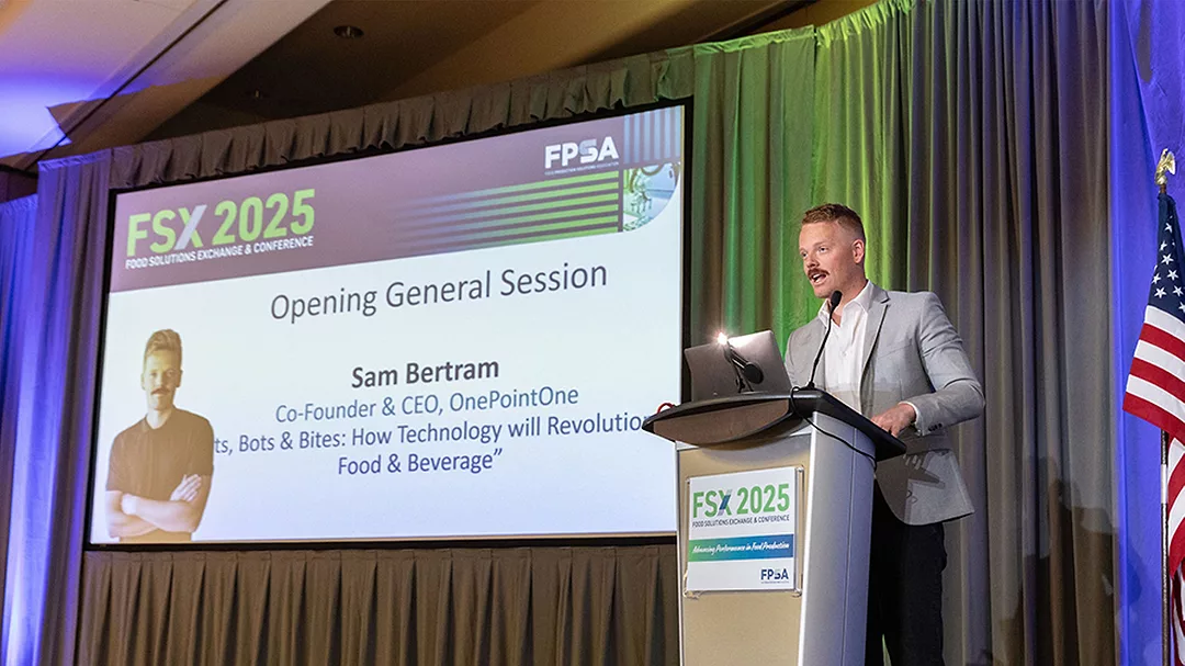 This image captures the opening general session of the FSX 2025: Food Solutions Exchange & Conference, where Sam Bertram, Co-Founder and CEO of OnePointOne, delivered a keynote speech.