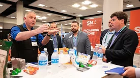 This image shows a trade show or exposition event, which is an opportunity for businesses to showcase products, services, and new developments. 