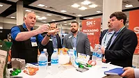 This image shows a trade show or exposition event, which is an opportunity for businesses to showcase products, services, and new developments. This image shows a trade show or exposition event, which is an opportunity for businesses to showcase products, services, and new developments.