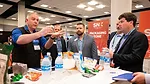 This image shows a trade show or exposition event, which is an opportunity for businesses to showcase products, services, and new developments. 