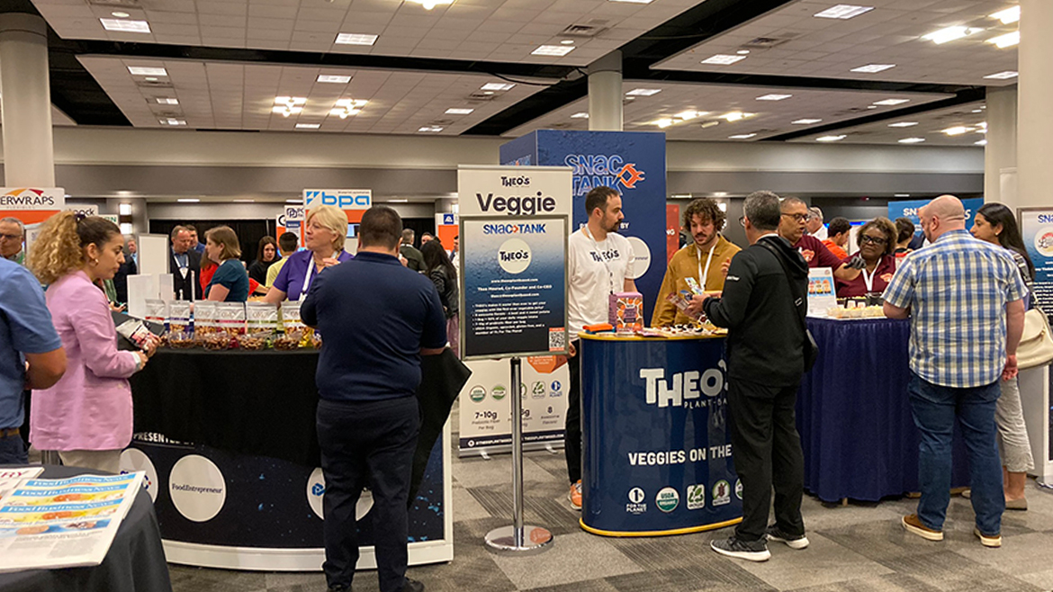 This image depicts the exhibition floor at the IFPA Global Produce & Floral Show, a major trade event for the fresh produce and floral industry. 