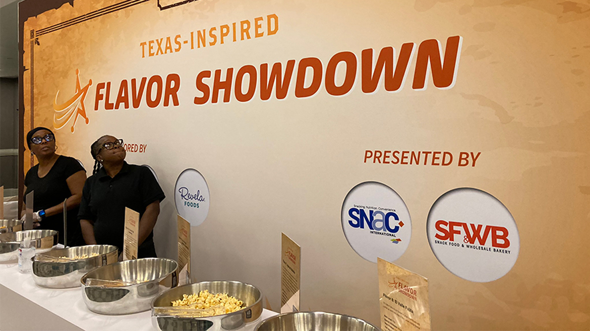 This image shows a "Texas-Inspired Flavor Showdown" event, likely a culinary competition or industry tasting, sponsored by Revela Foods and presented by Snack Food & Wholesale Bakery. 