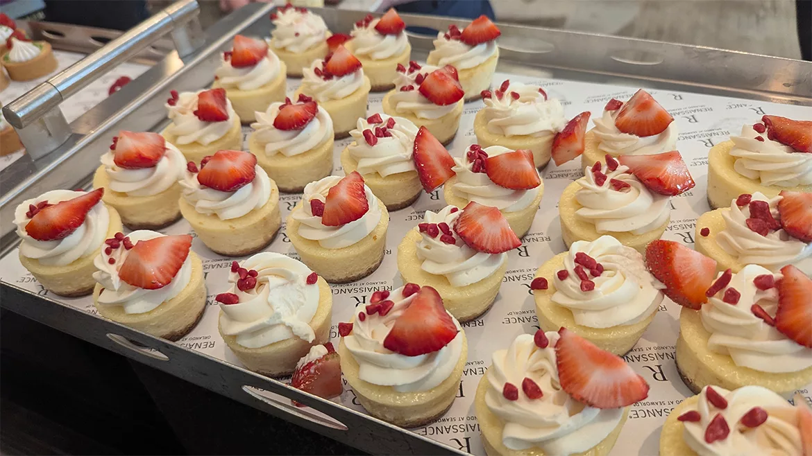 A rectangular-shaped strawberry dessert topped with fresh fruit.