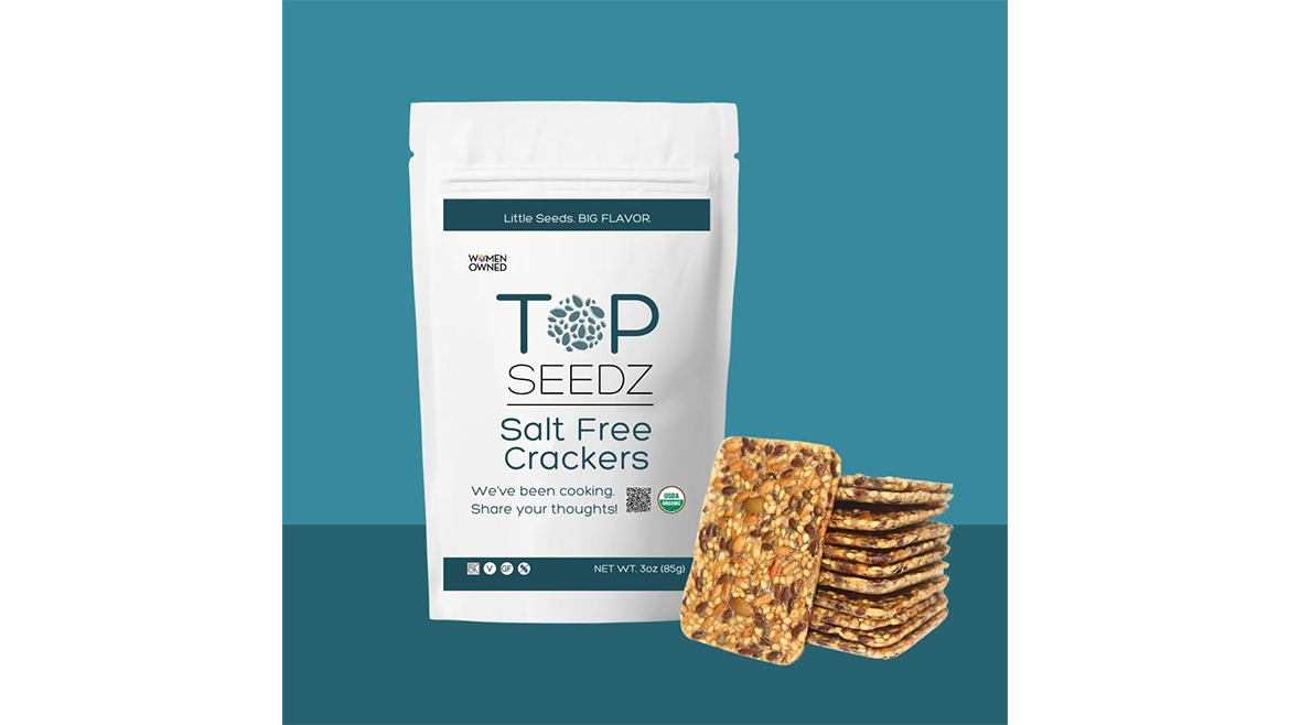 Pouch of Top Seedz Salt-Free Crackers on turquoise background