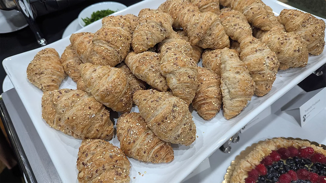 White tray full of mini croissants