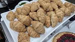 White tray full of mini croissants