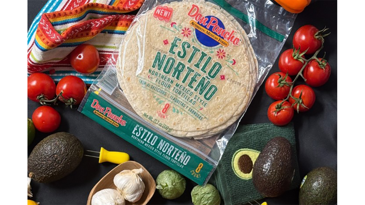 Package of Estilo Norteno tortillas with assorted vegetables on table