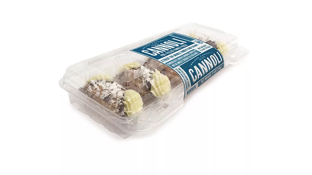 Clamshell container of Golden Cannoli desserts