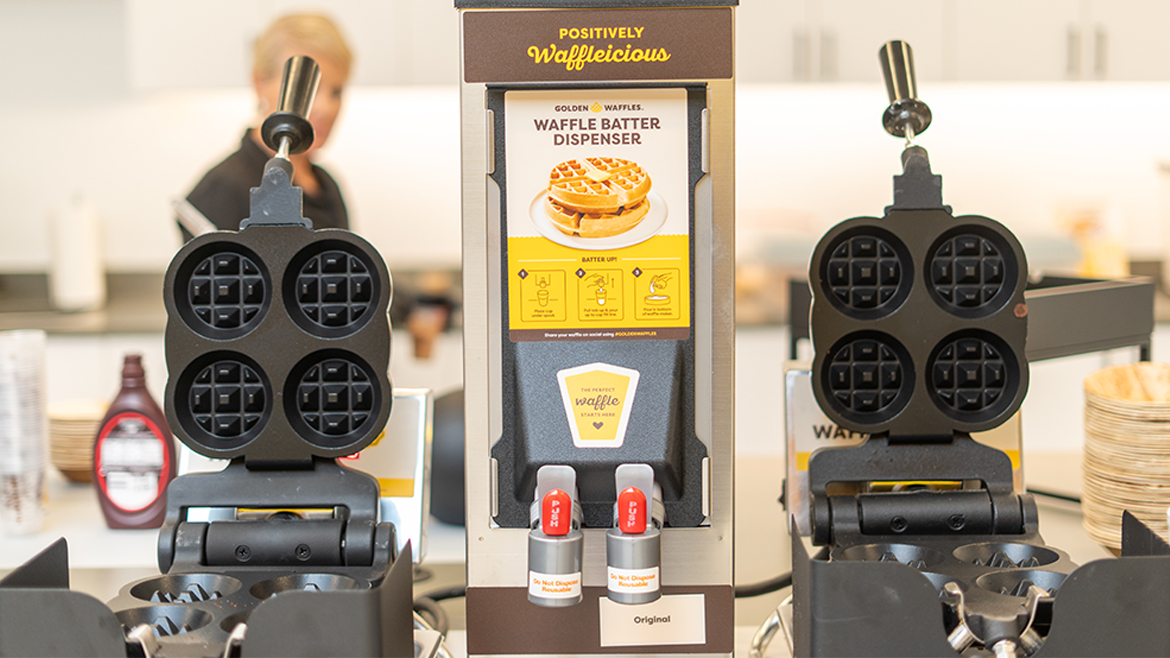 Two Golden Waffles foodservice machines by batter dispenser