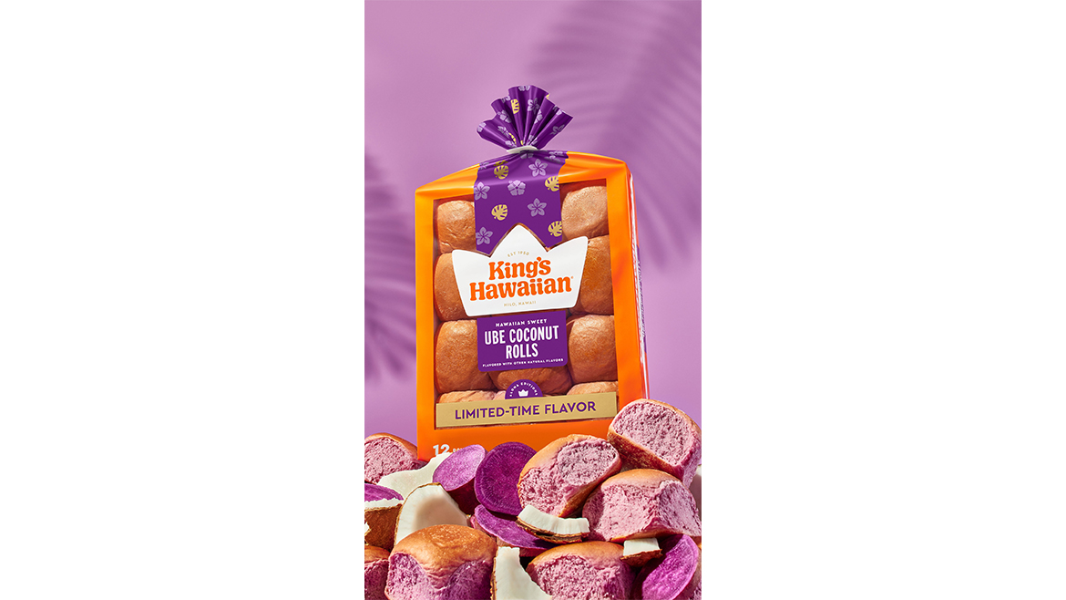 Packages of King’s Hawaiian Ube Coconut rolls on purple background 