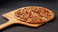 Red Baron’s new Korean BBQ pizza fresh from the oven, cut into slices. Red Baron’s new Korean BBQ pizza fresh from the oven, cut into slices.