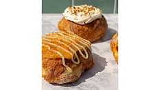 Mango Margarita and Coconut cream doughnuts on table