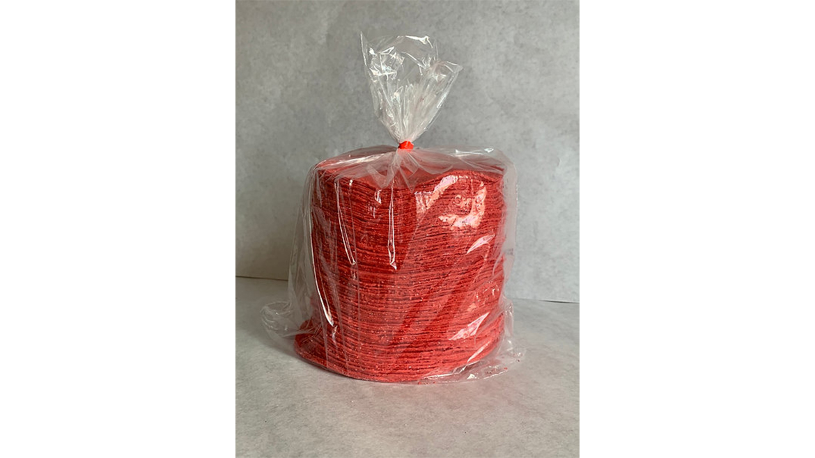 Package of red corn tortillas on white background