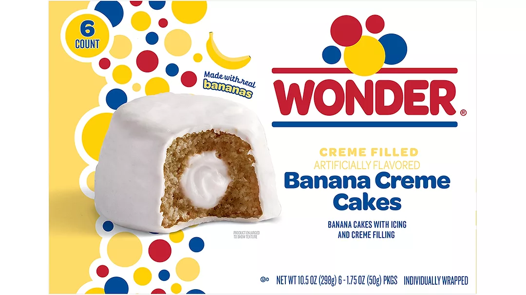 Pink and white packaging with a picture of Wonder strawberry mini donuts on it.