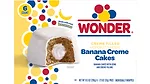 Pink and white packaging with a picture of Wonder strawberry mini donuts on it.