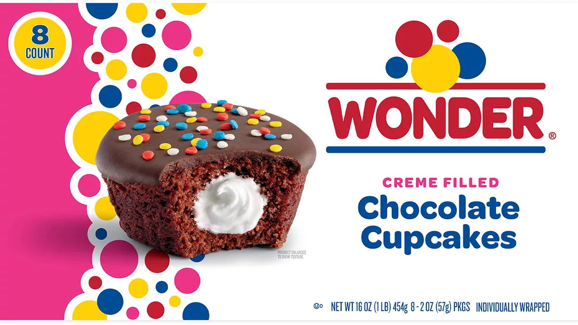 Pink and white packaging with a picture of Wonder crème filled chocolate cupcakes on it.