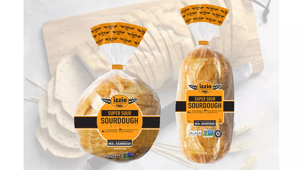 Two loaves of bread, one more round and one more long/rectangular, both in packaging.