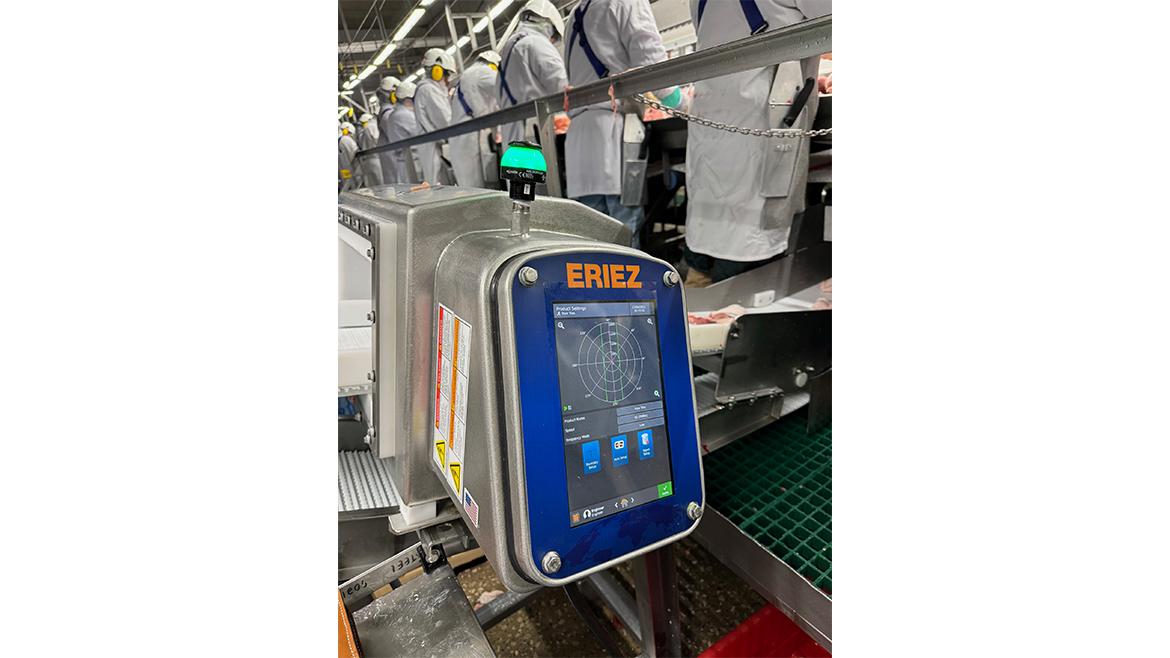 This is an industrial metal detector, specifically the Eriez X8 or Xtreme series, designed to identify metal contaminants in food and packaged goods. 