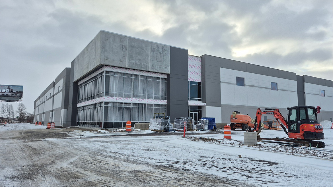 Exterior shot of a warehouse under construction
