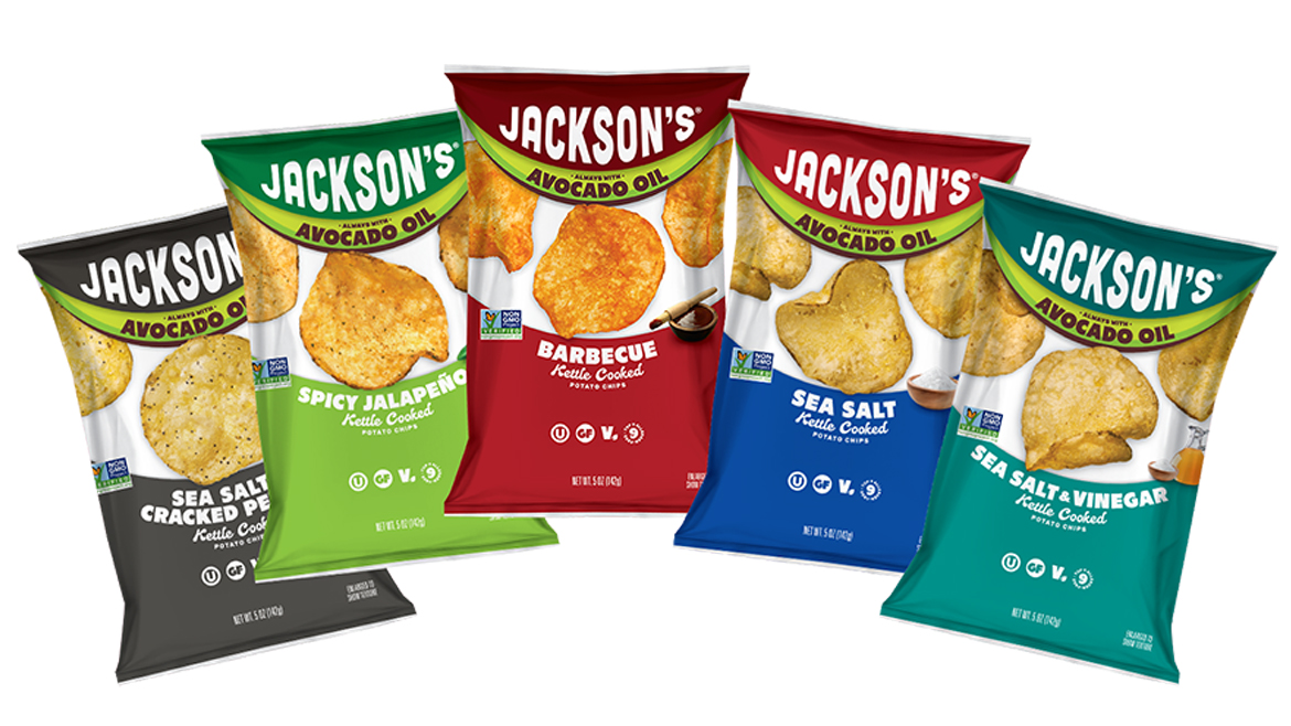 Five bags of Jackson’s kettle chips on white background