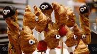 Display of various pastries decorated with googly eyes Display of various pastries decorated with googly eyes