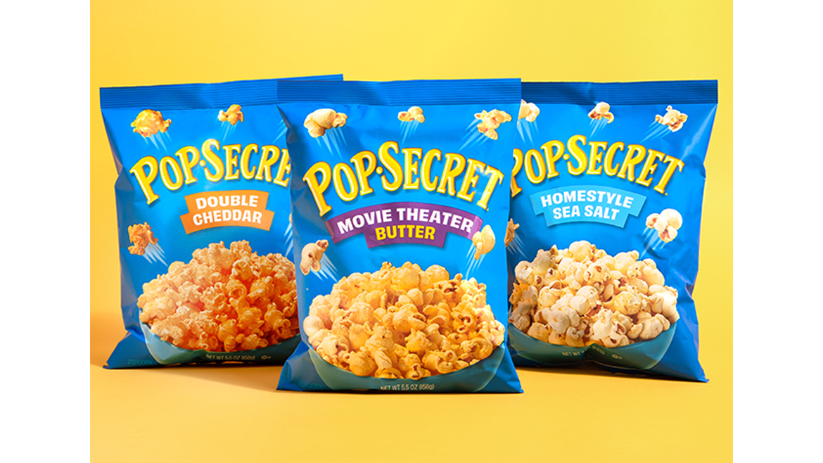 Ready-to-eat packages of Pop Secret popcorn in Double Cheddar, Movie Theater Butter, and Homestyle Sea Salt flavors.
