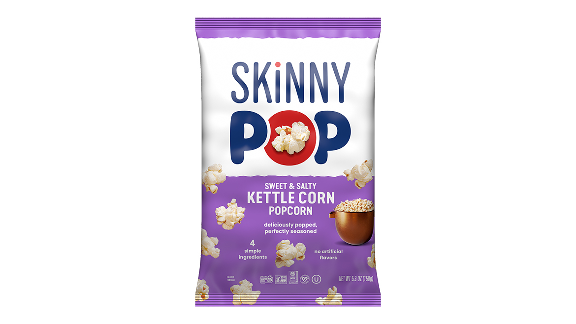 A purple bag of SkinnyPop sweet & salty kettle corn popcorn.