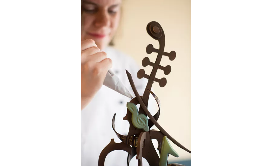 Elizabeth Foley working on a chocolate sculpture.
