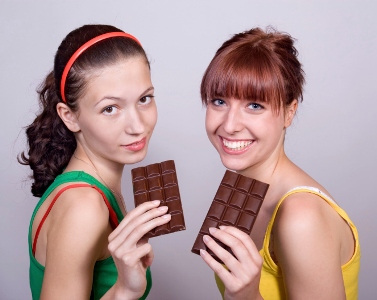 teens eating chocolate