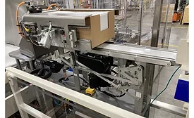 R.A. Jones automatic magazine loader for cartoning machines