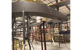 Multi-Conveyor elevated conveyor conserves critical floor space