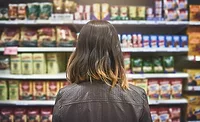 grocery store shelves and woman grocery store shelves and woman